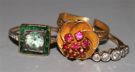 An 18ct gold and five stone diamond ring & two other gold dress rings.